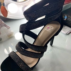Brand new black heel with rhinestones